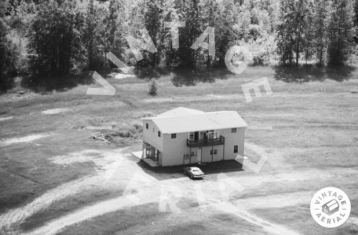 home built on snack bar foundation 1980 aerial photo Bay Drive-In Theatre, Pinconning